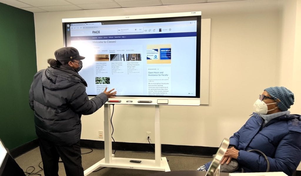 faculty use a smart board